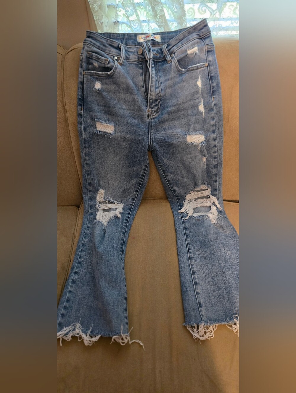 Distressed Light Blue Flare Jeans for Women - Ripped Hem Denim